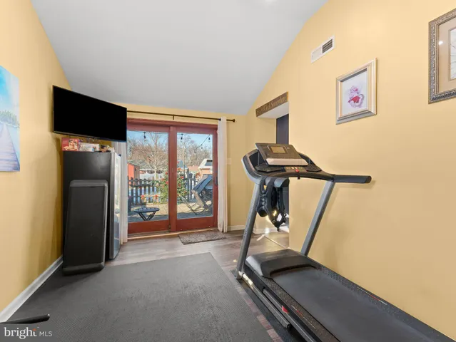 a view of a room with gym equipment