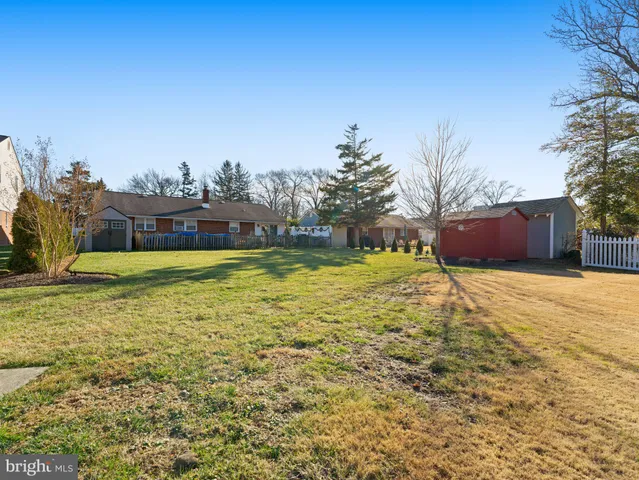 a view of a pool with an outdoor space