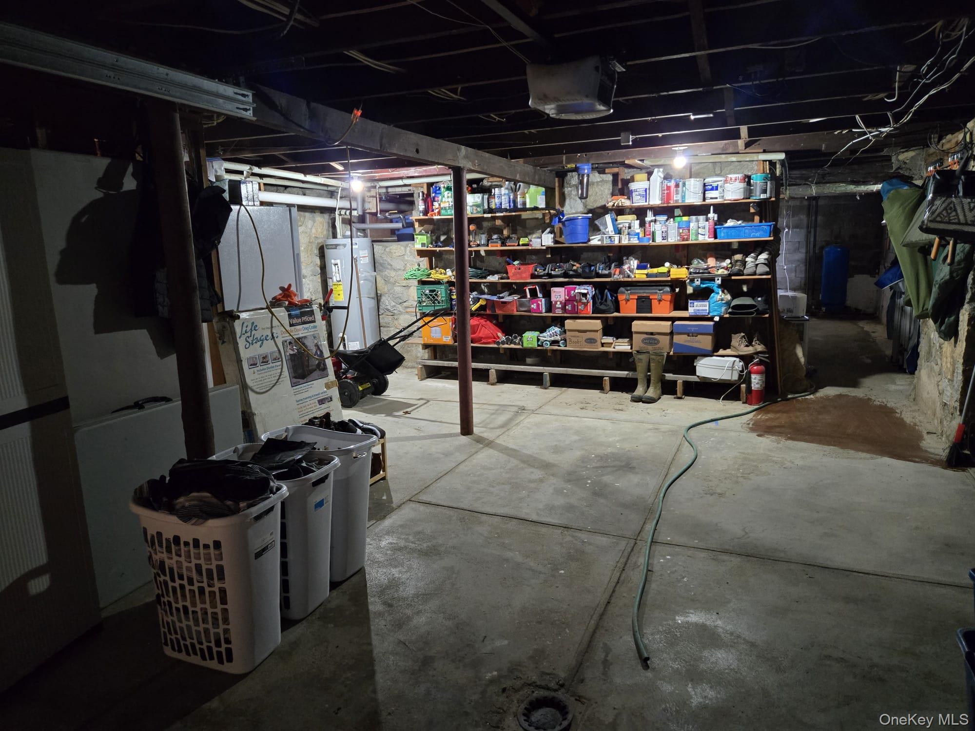 14 Lowell Road Carmel, NY 10512 - Photo 17 of 24 Large, high-ceilinged basement.