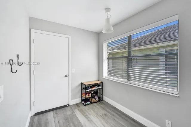 a view of a room with toys and a window