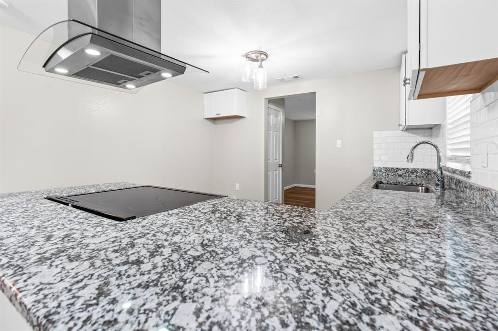 1210 Southey Street Waco, TX 76704 - Photo 7 of 29 a bathroom with a sink a vanity and a mirror