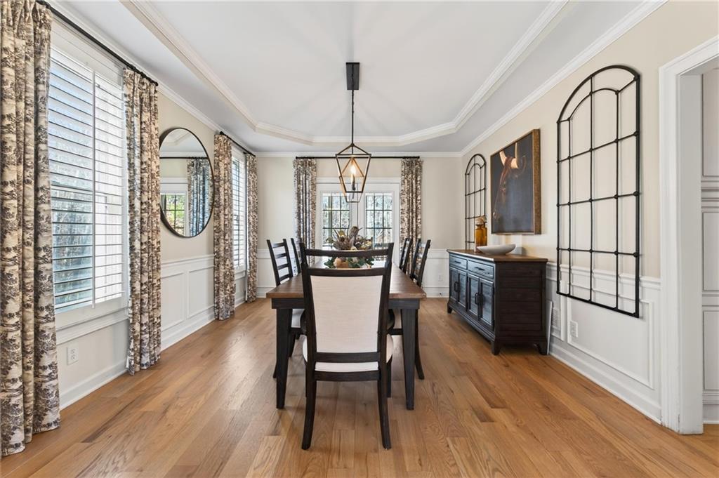 248 Cedarhurst Drive Canton, GA 30115 - Photo 11 of 76 a view of a dining room with furniture window and wooden floor