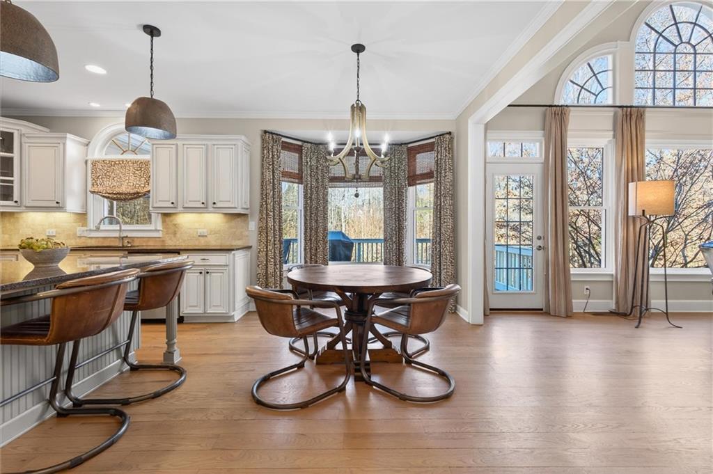 248 Cedarhurst Drive Canton, GA 30115 - Photo 17 of 76 a view of a dining room with furniture window and wooden floor