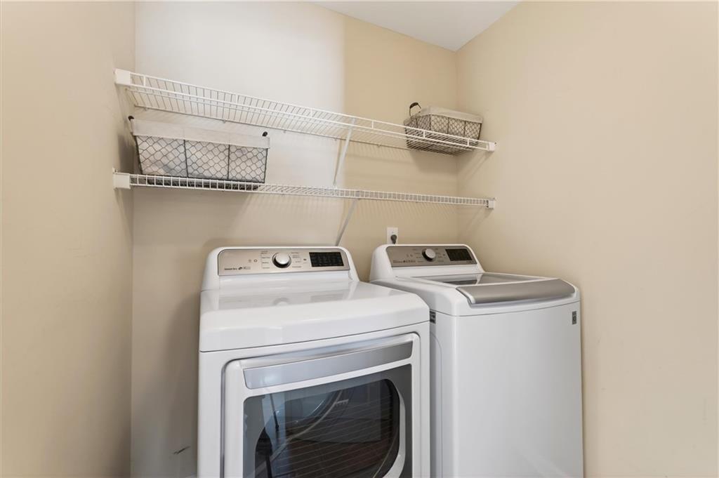 248 Cedarhurst Drive Canton, GA 30115 - Photo 34 of 76 a utility room with dryer and washer