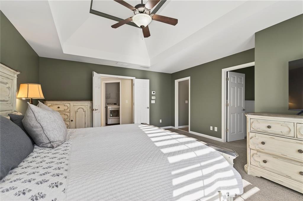 248 Cedarhurst Drive Canton, GA 30115 - Photo 38 of 76 a large bedroom with a bed and a dresser