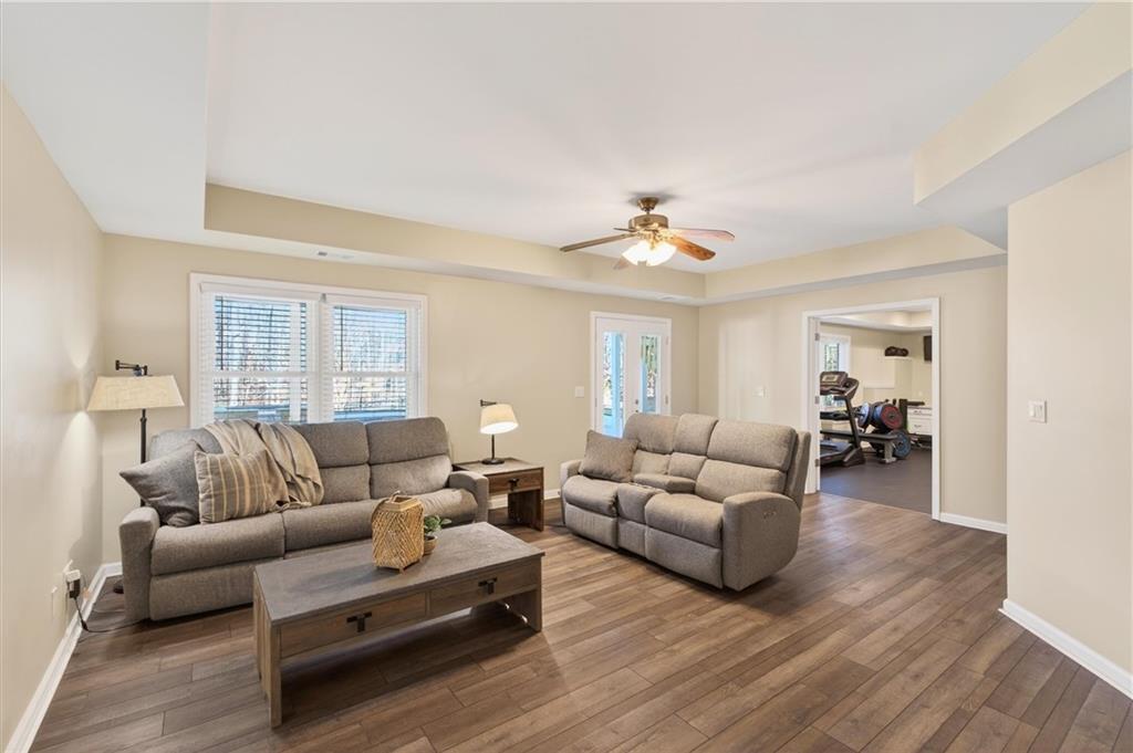 248 Cedarhurst Drive Canton, GA 30115 - Photo 42 of 76 a living room with furniture and a wooden floor