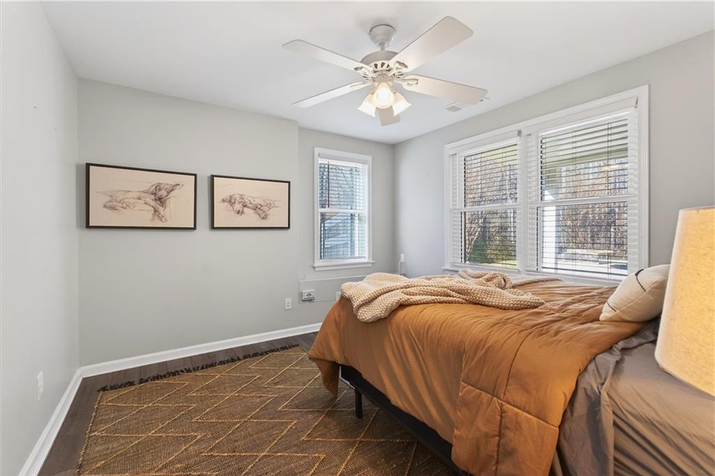 248 Cedarhurst Drive Canton, GA 30115 - Photo 43 of 76 a bedroom with a large bed and a window
