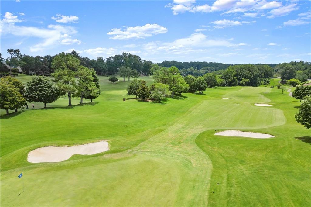 248 Cedarhurst Drive Canton, GA 30115 - Photo 71 of 76 a view of a golf course with a garden