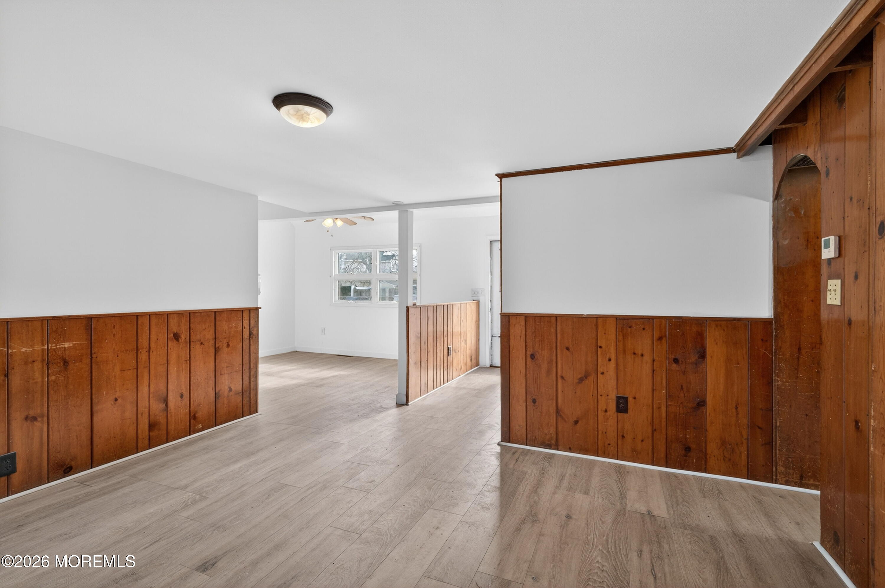 11 Cedar Road Brick, NJ 08723 - Photo 13 of 39 a view of an empty room with wooden floor