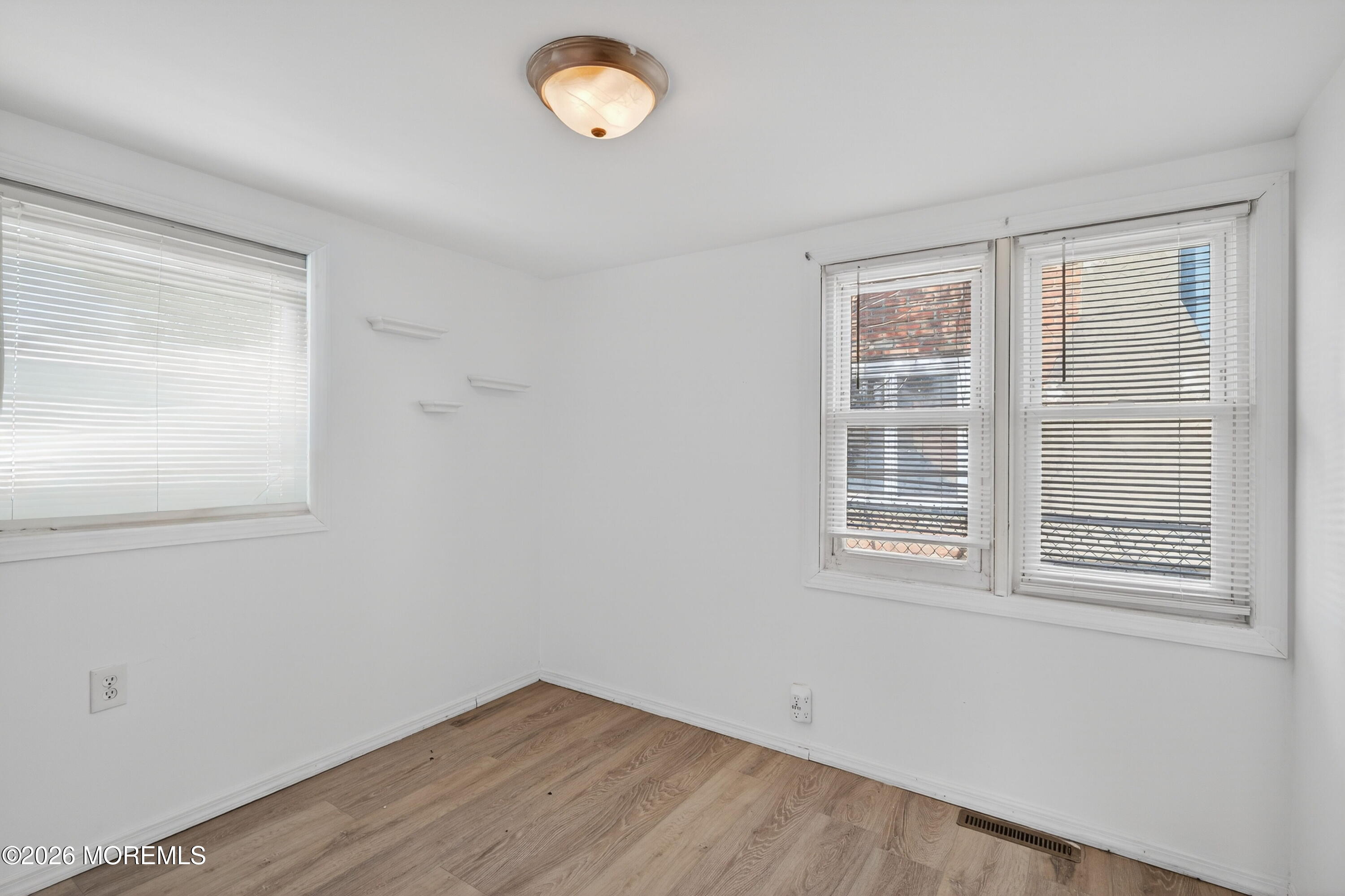 11 Cedar Road Brick, NJ 08723 - Photo 19 of 39 an empty room with a window