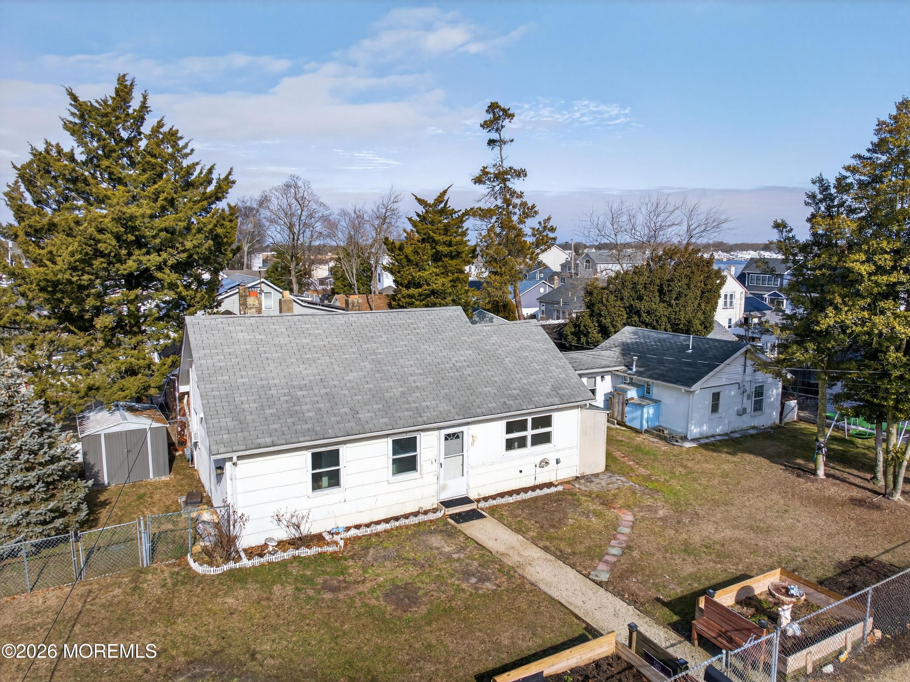 11 Cedar Road Brick, NJ 08723 - Photo 2 of 39 a aerial view of a house with a yard and sitting area