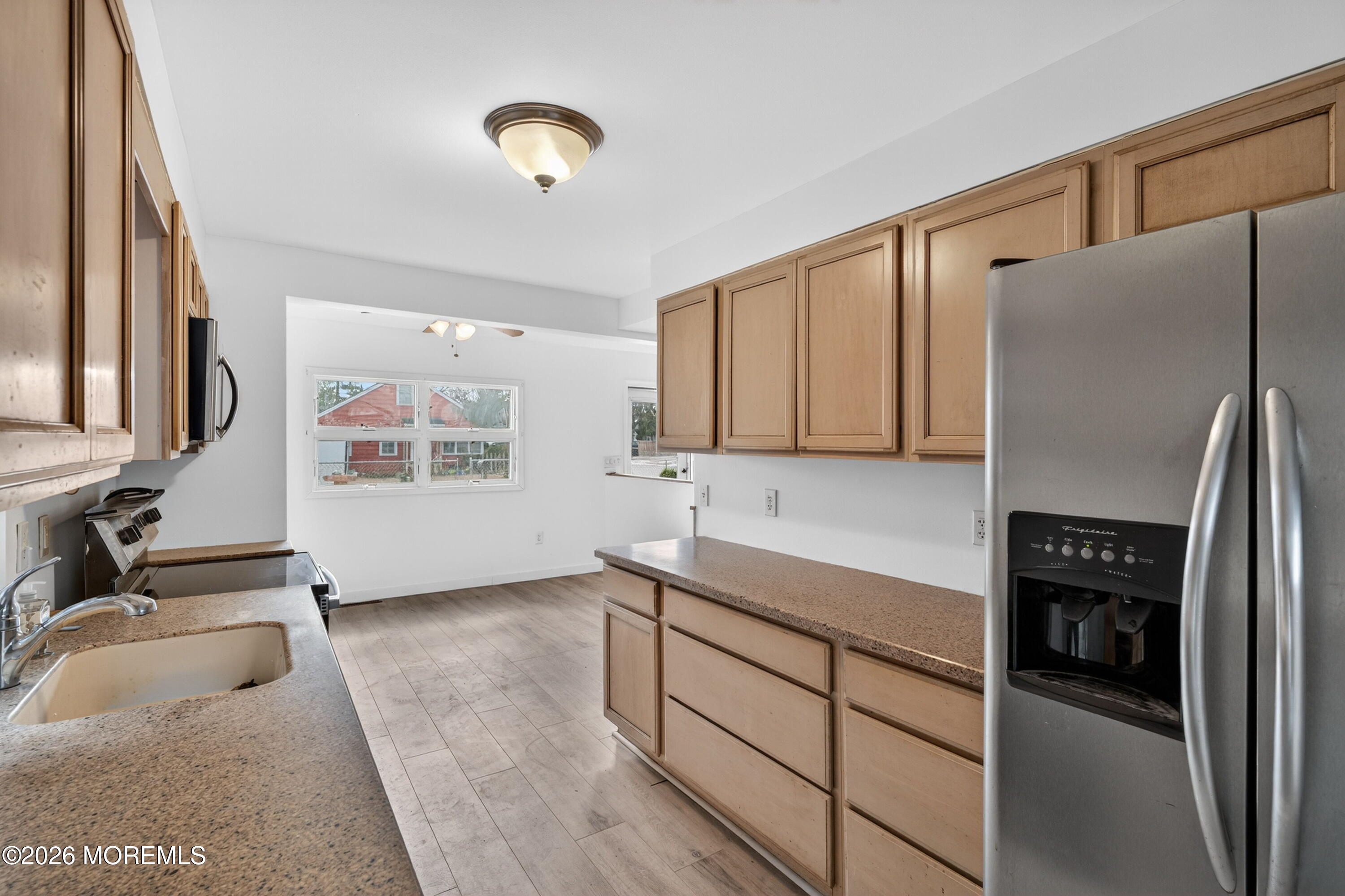 11 Cedar Road Brick, NJ 08723 - Photo 34 of 39 a kitchen with stainless steel appliances granite countertop a refrigerator and a sink