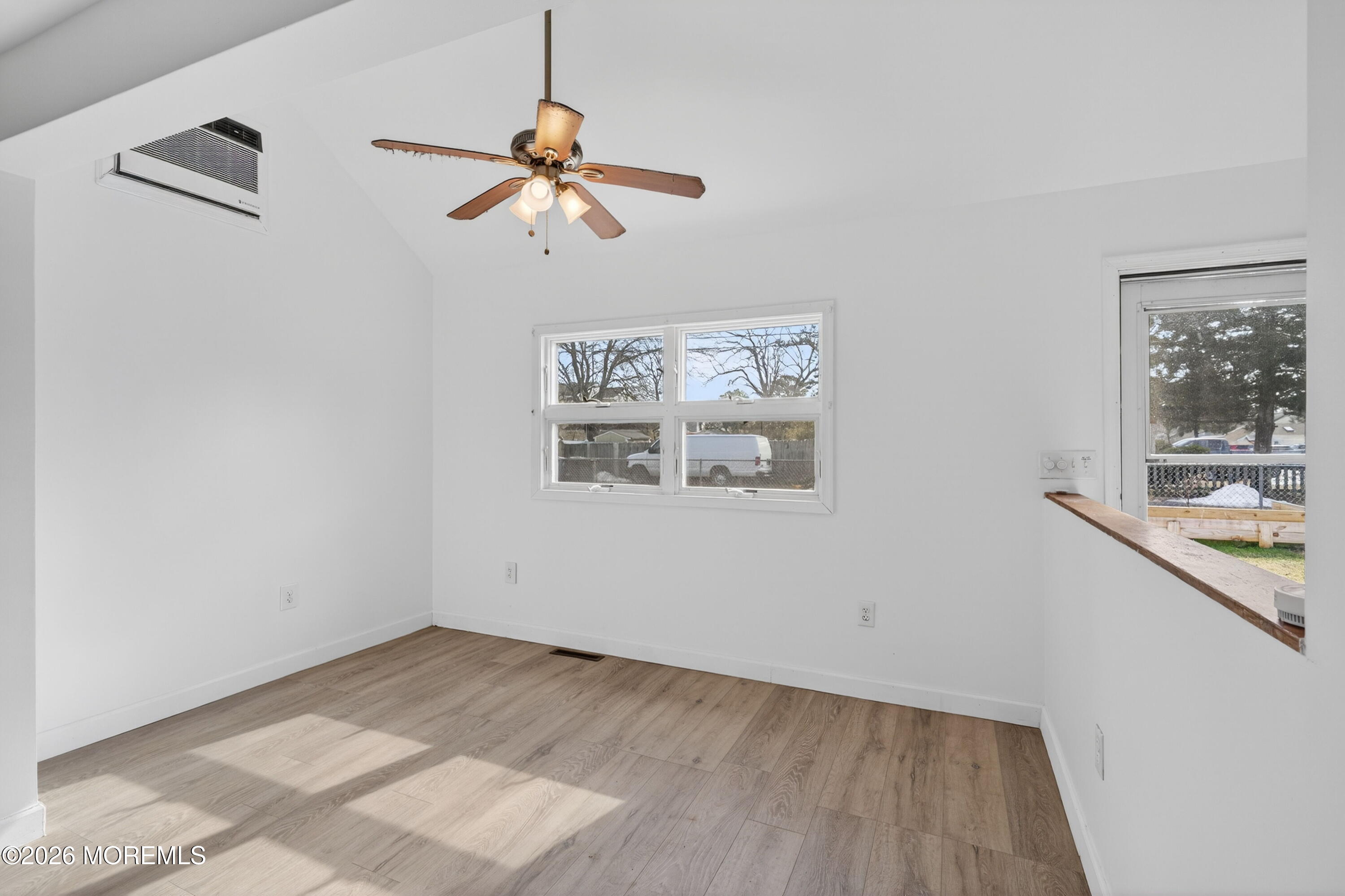 11 Cedar Road Brick, NJ 08723 - Photo 8 of 39 a view of a big room with wooden floor and windows