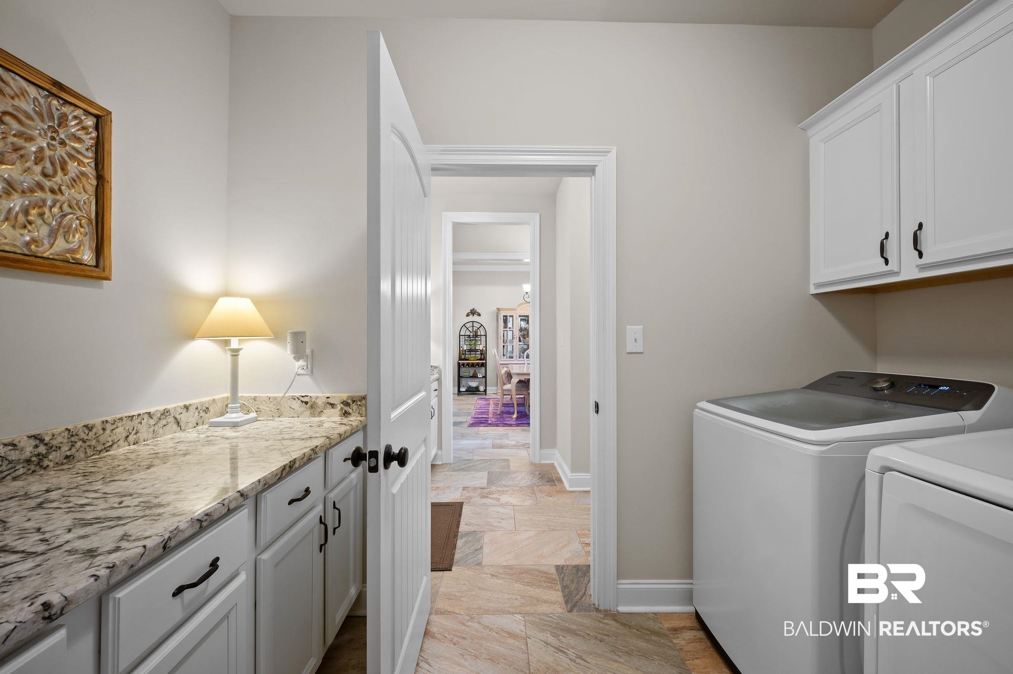 33842 Rutland Lane Spanish Fort, AL 36527 - Photo 32 of 42 Washroom featuring baseboards, cabinet space, and washer and clothes dryer