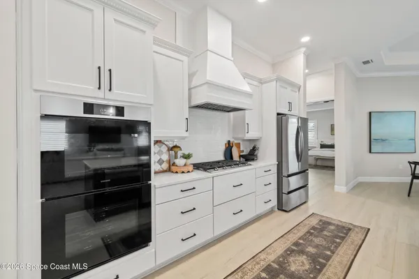 a room with storage and a white walls