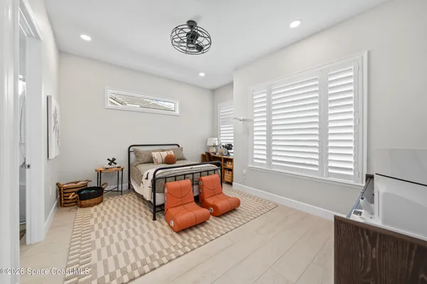 a bathroom with a sink a vanity and a mirror
