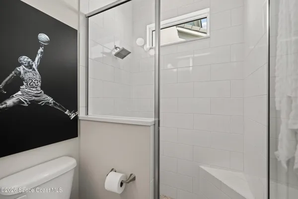 a kitchen with granite countertop a sink stove and cabinets
