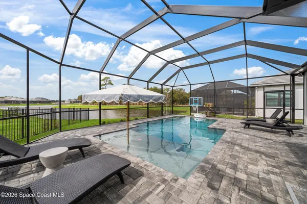 a view of a backyard with a garden