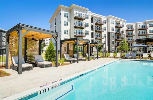 a view of tall building with large windows and a outdoor view