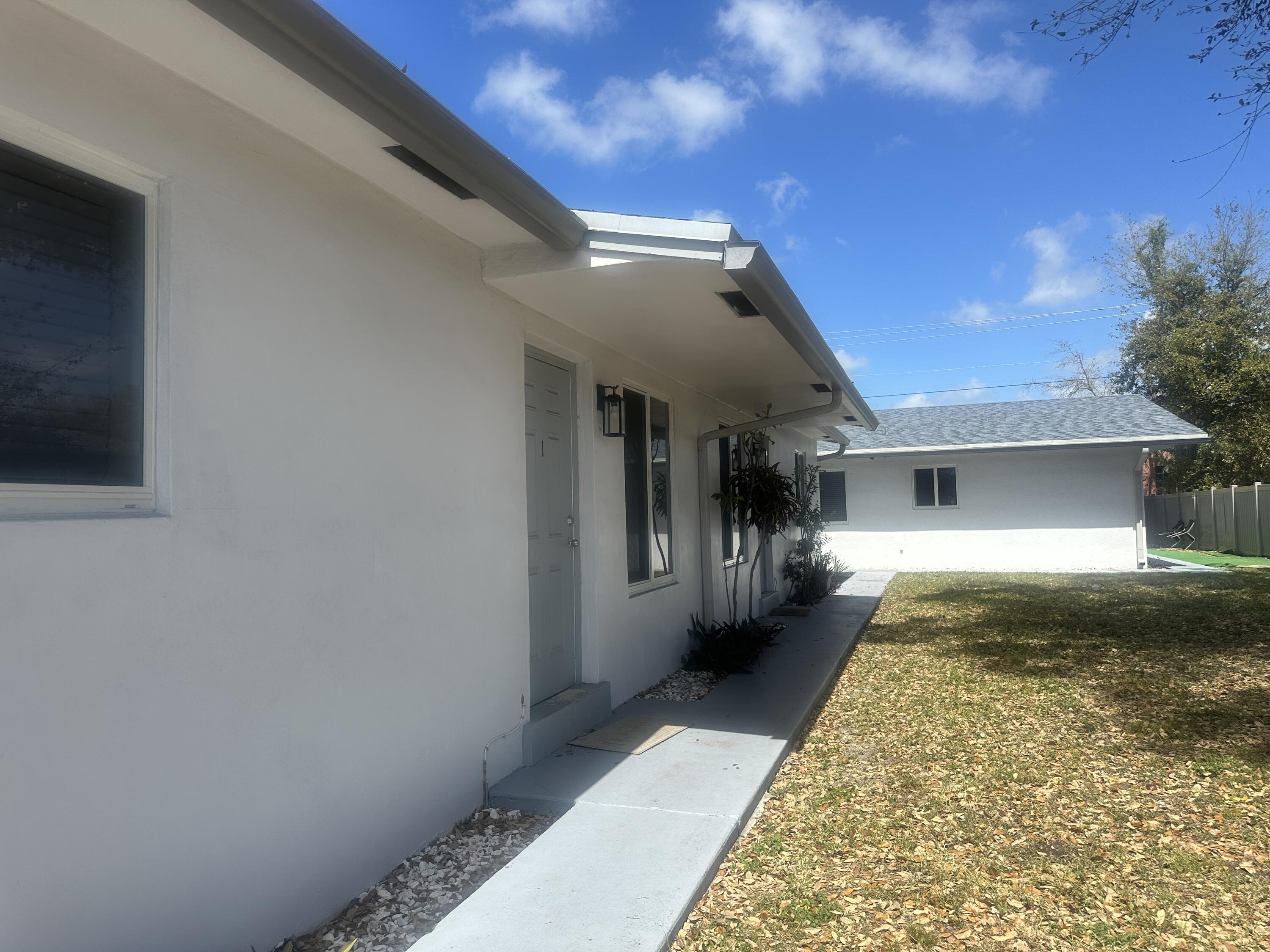 6109 Southwest 30th Street Miramar, FL 33023 - Photo 1 of 22 a view of backyard of the house