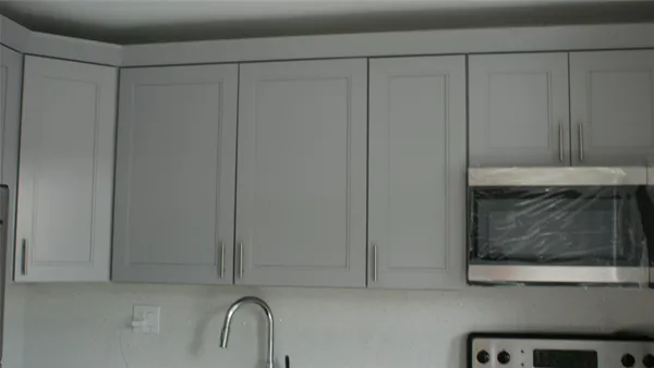 a bathroom with a sink and vanity