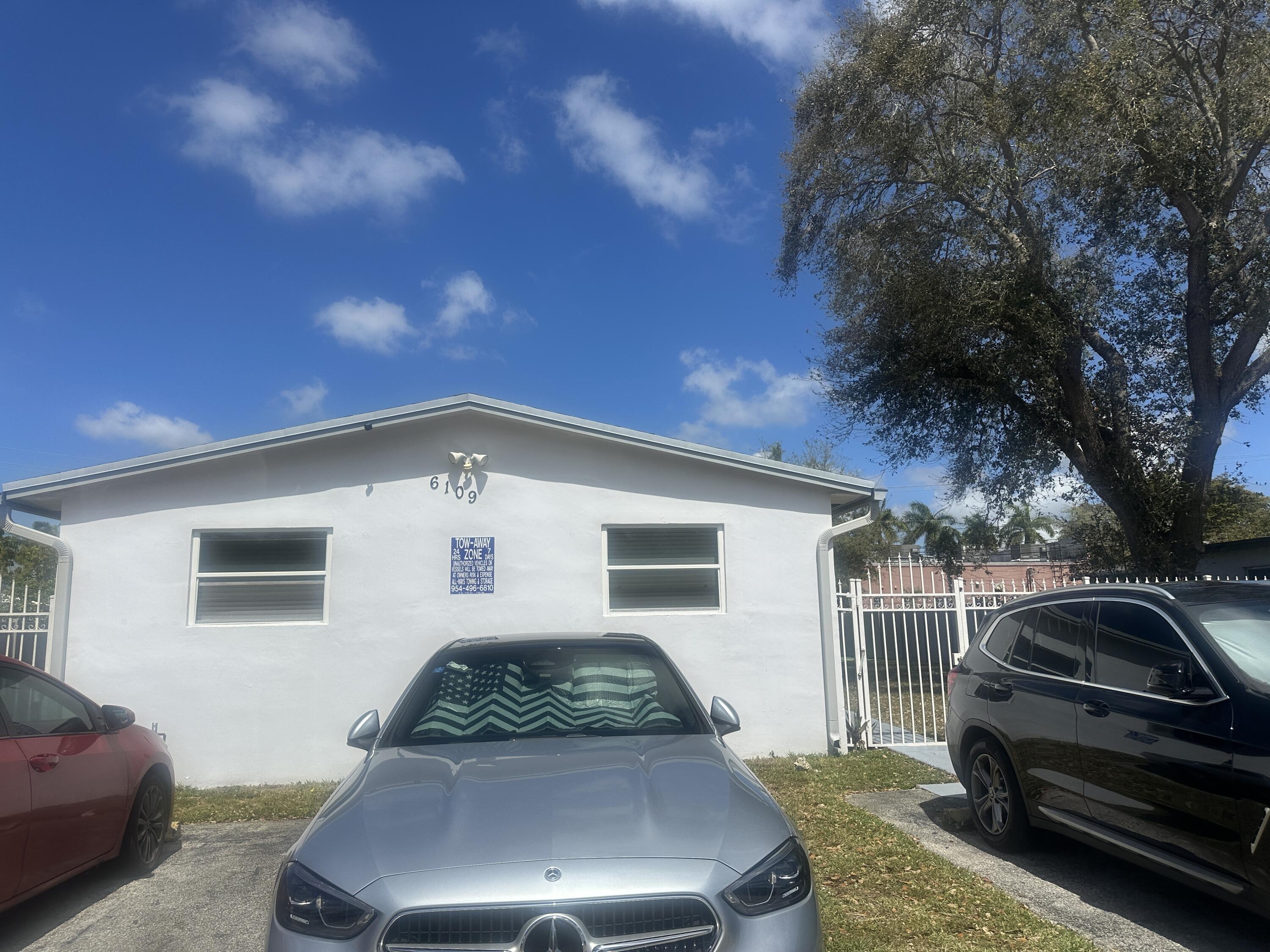 6109 Southwest 30th Street Miramar, FL 33023 - Photo 2 of 22 a front view of a house with parking space
