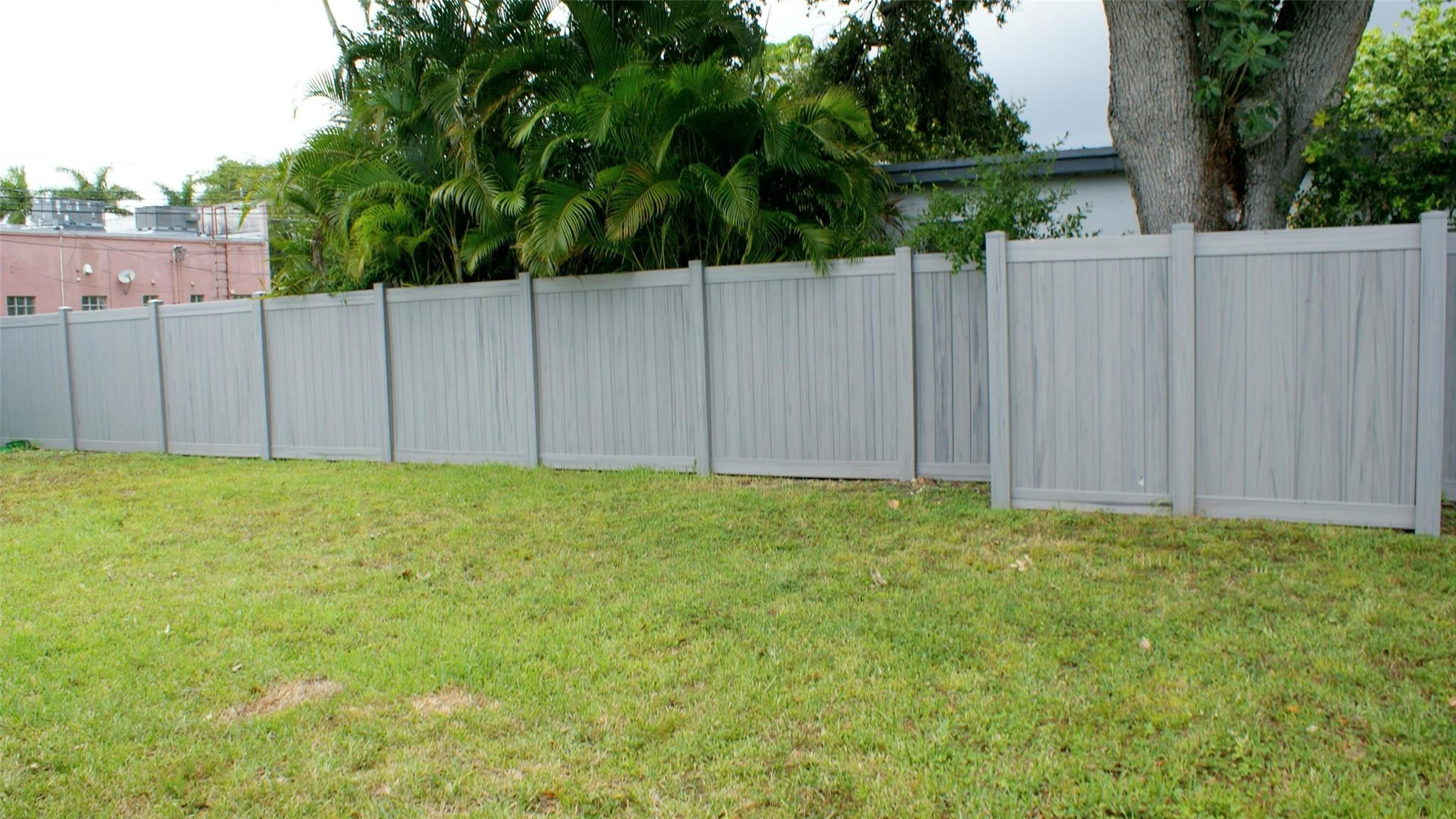 6109 Southwest 30th Street Miramar, FL 33023 - Photo 21 of 22 a view of backyard with wooden fence