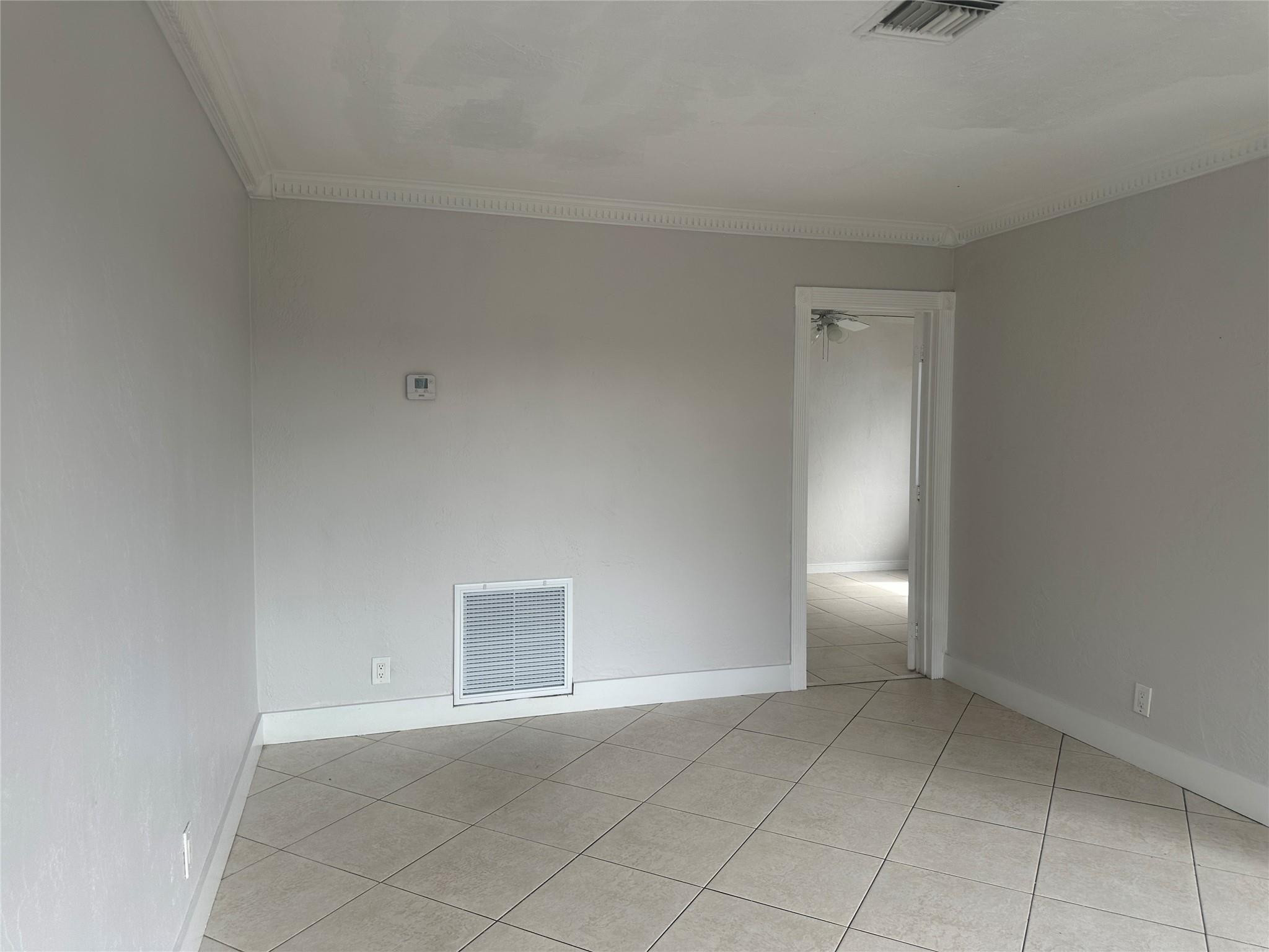 6109 Southwest 30th Street Miramar, FL 33023 - Photo 7 of 22 a view of an empty room and window