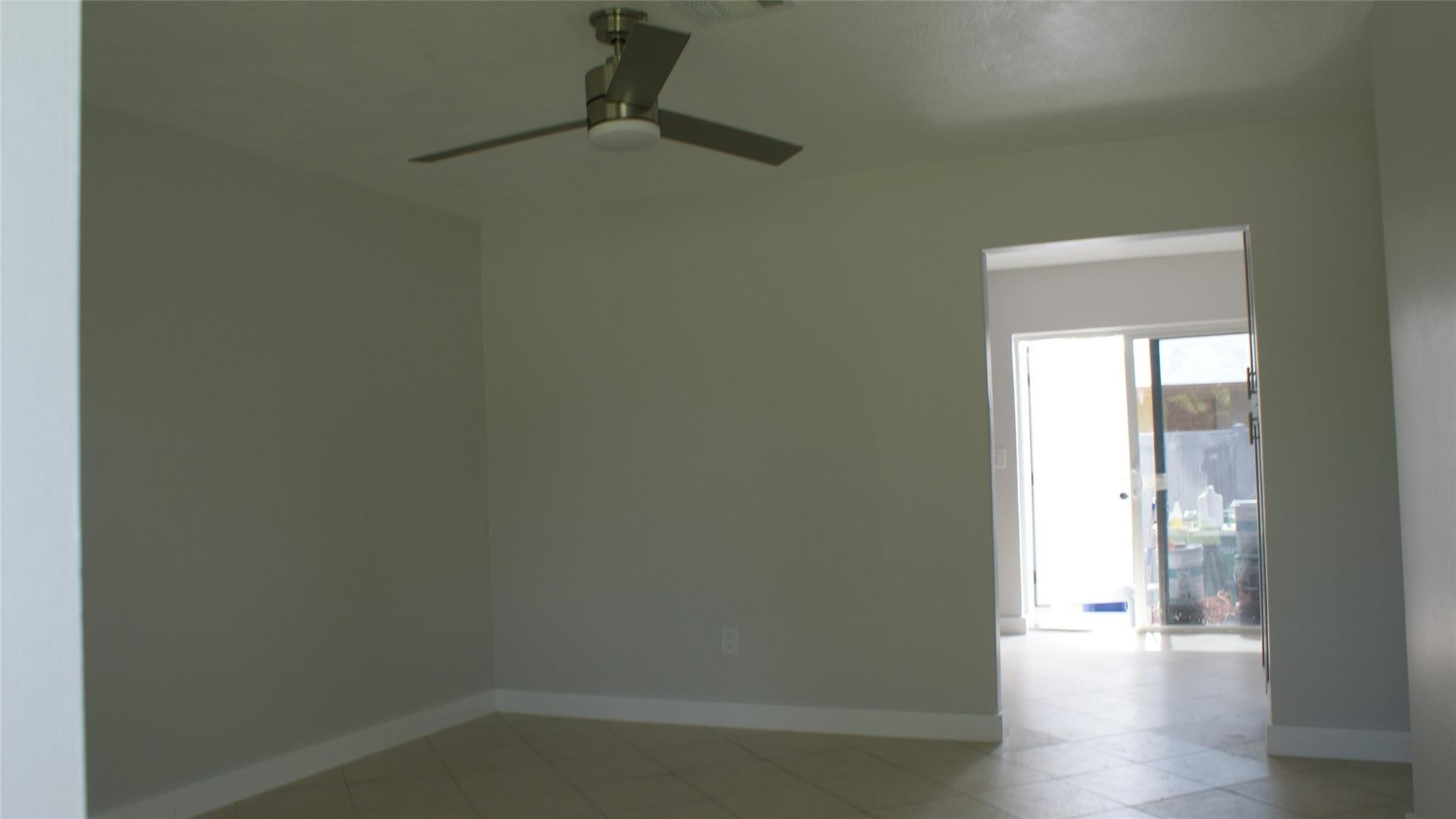 6109 Southwest 30th Street Miramar, FL 33023 - Photo 8 of 22 a view of a small space with wooden floor and a sink