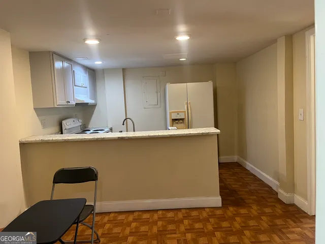 a room with furniture and a window