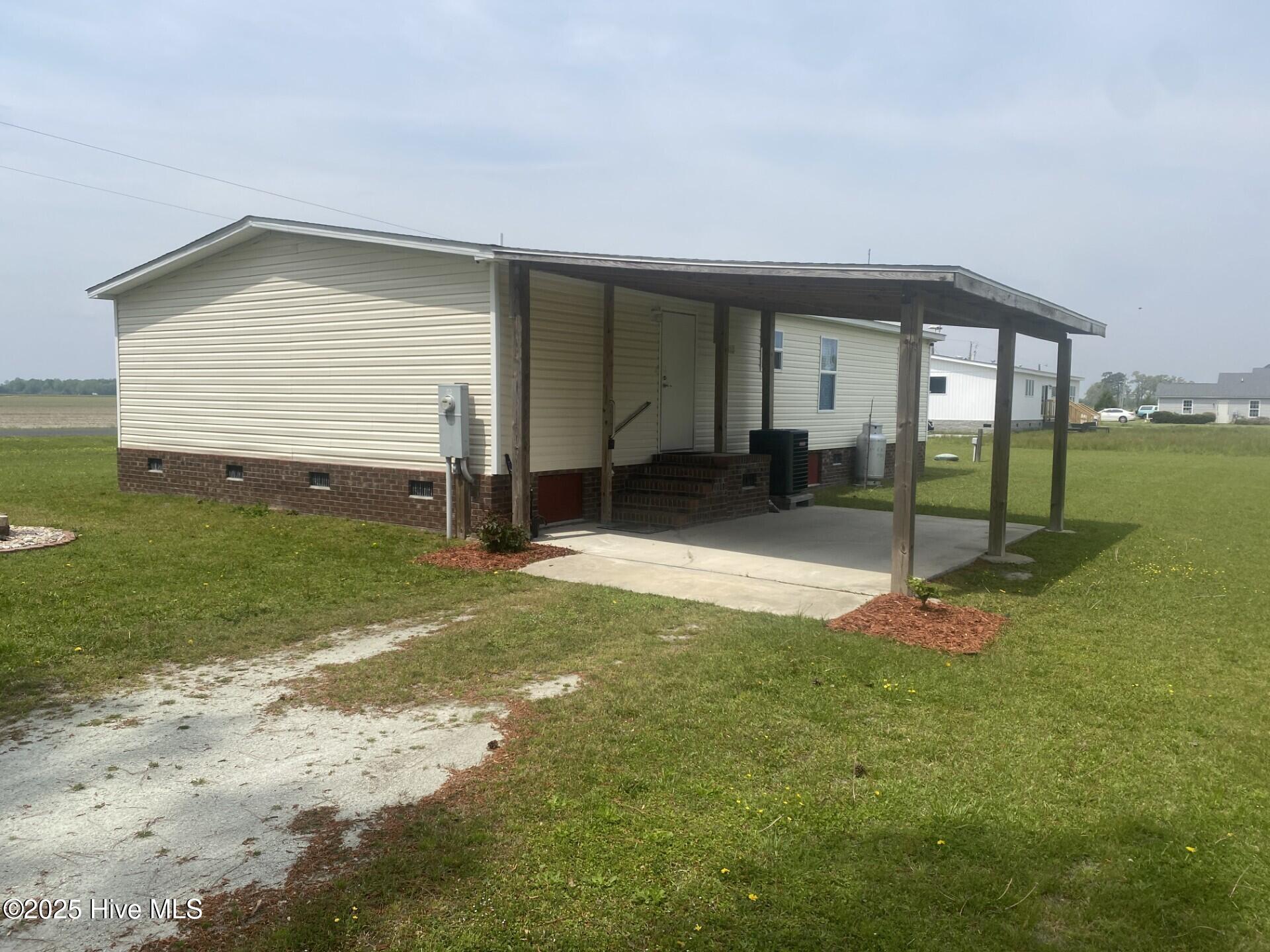 80 Rowe Road Bayboro, NC 28515 - Photo 4 of 14 80 Rowe Road - rear view