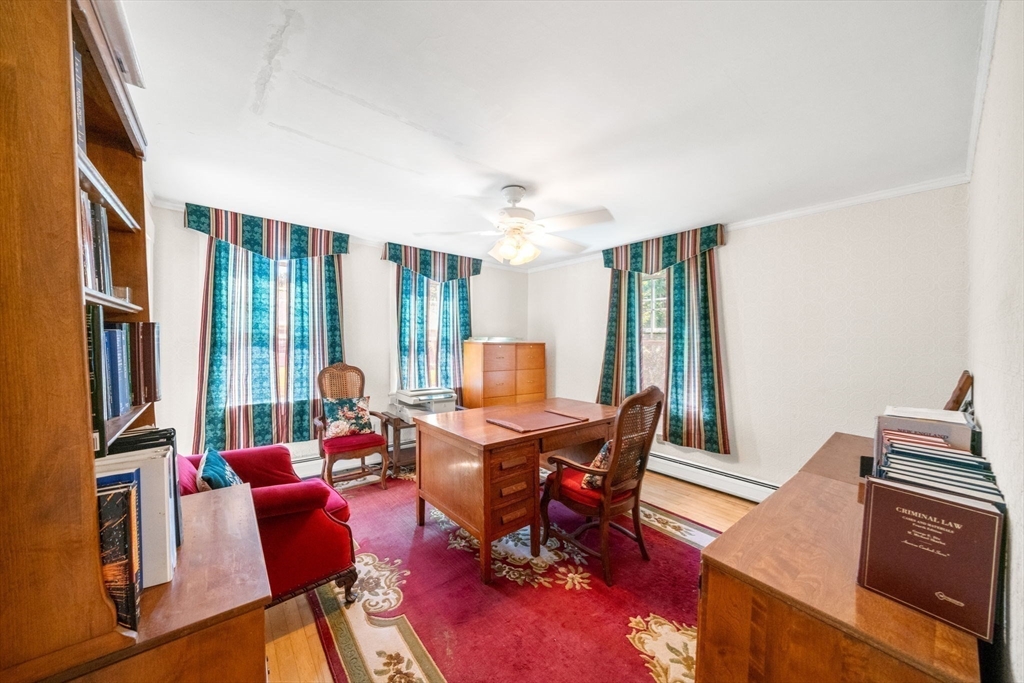1406 Tucker Road Dartmouth, MA 02747 - Photo 16 of 30 a living room with furniture a large window and a potted plant