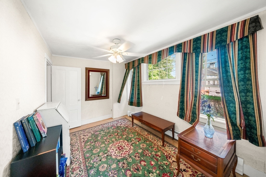 1406 Tucker Road Dartmouth, MA 02747 - Photo 20 of 30 a living room with large window and a couch