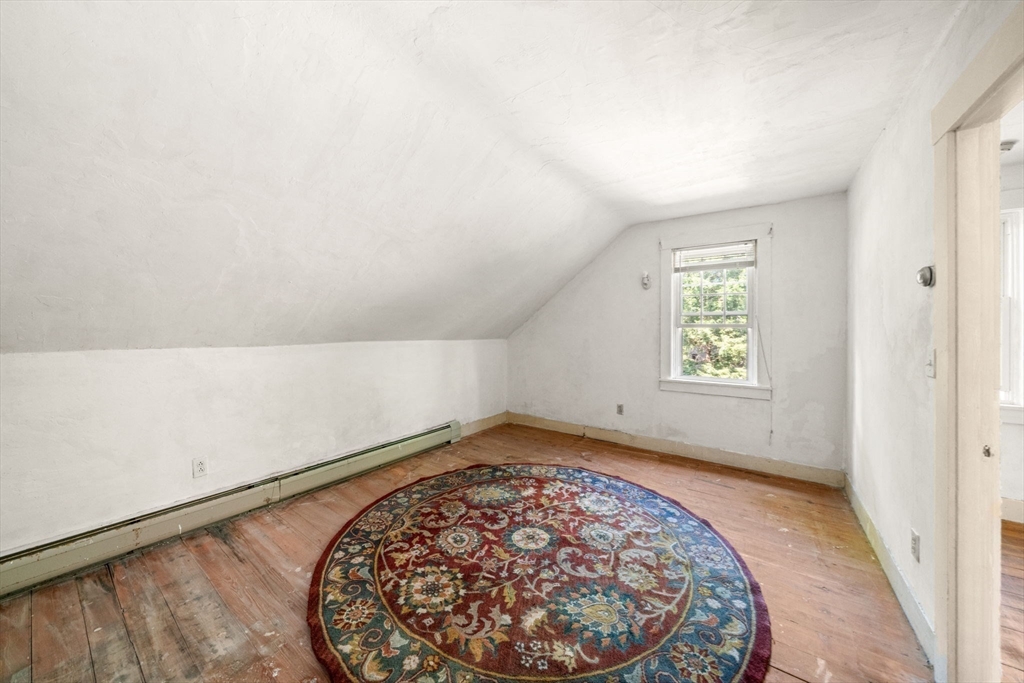 1406 Tucker Road Dartmouth, MA 02747 - Photo 22 of 30 an empty room with a rug