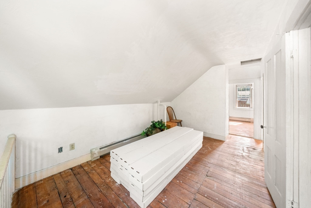 1406 Tucker Road Dartmouth, MA 02747 - Photo 23 of 30 a bedroom with a bed and the view of wooden floor