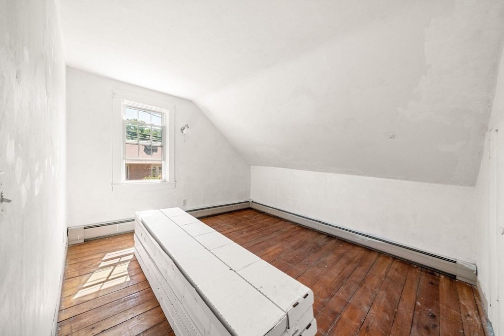 1406 Tucker Road Dartmouth, MA 02747 - Photo 24 of 30 a view of room with window and wooden floor
