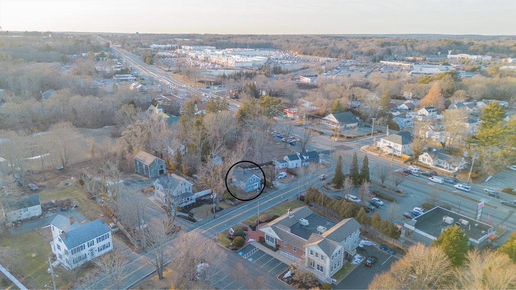 1406 Tucker Road Dartmouth, MA 02747 - Photo 28 of 30 an aerial view of a house with a yard