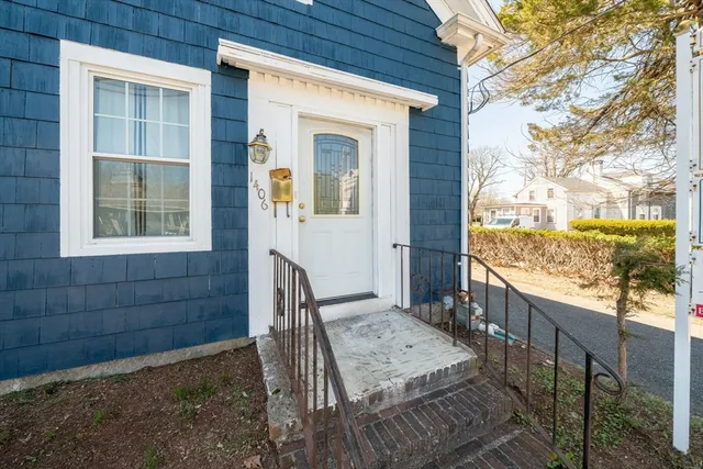 a view of a deck with wooden floor and fence