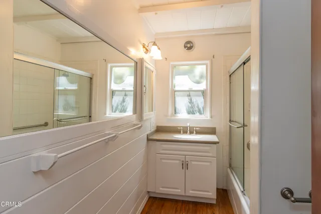 a bathroom with a sink and a bathtub