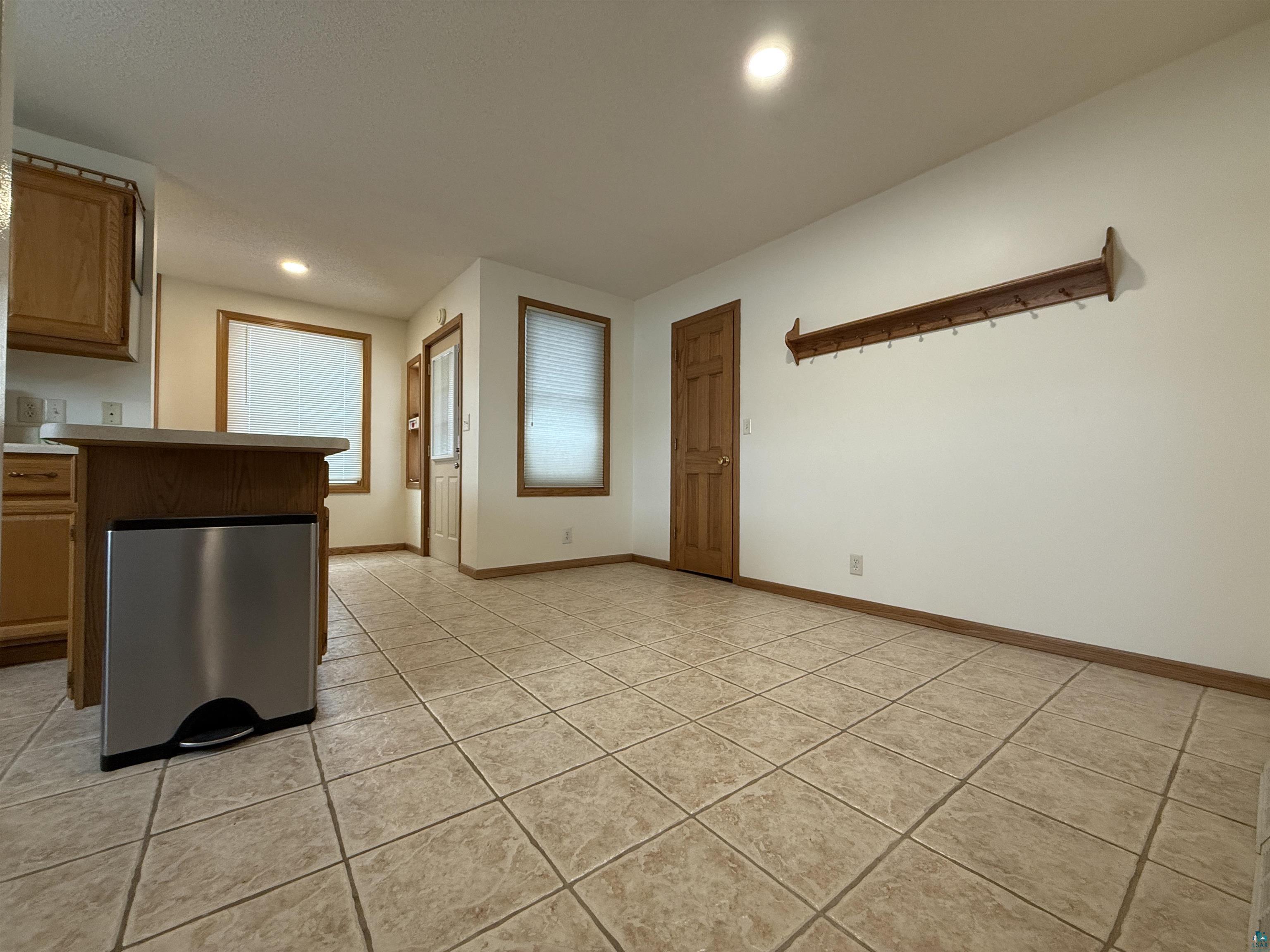 1321 South 13th Street Virginia, MN 55792 - Photo 6 of 33 Kitchen featuring light tile patterned floors, light countertops, and recessed lighting