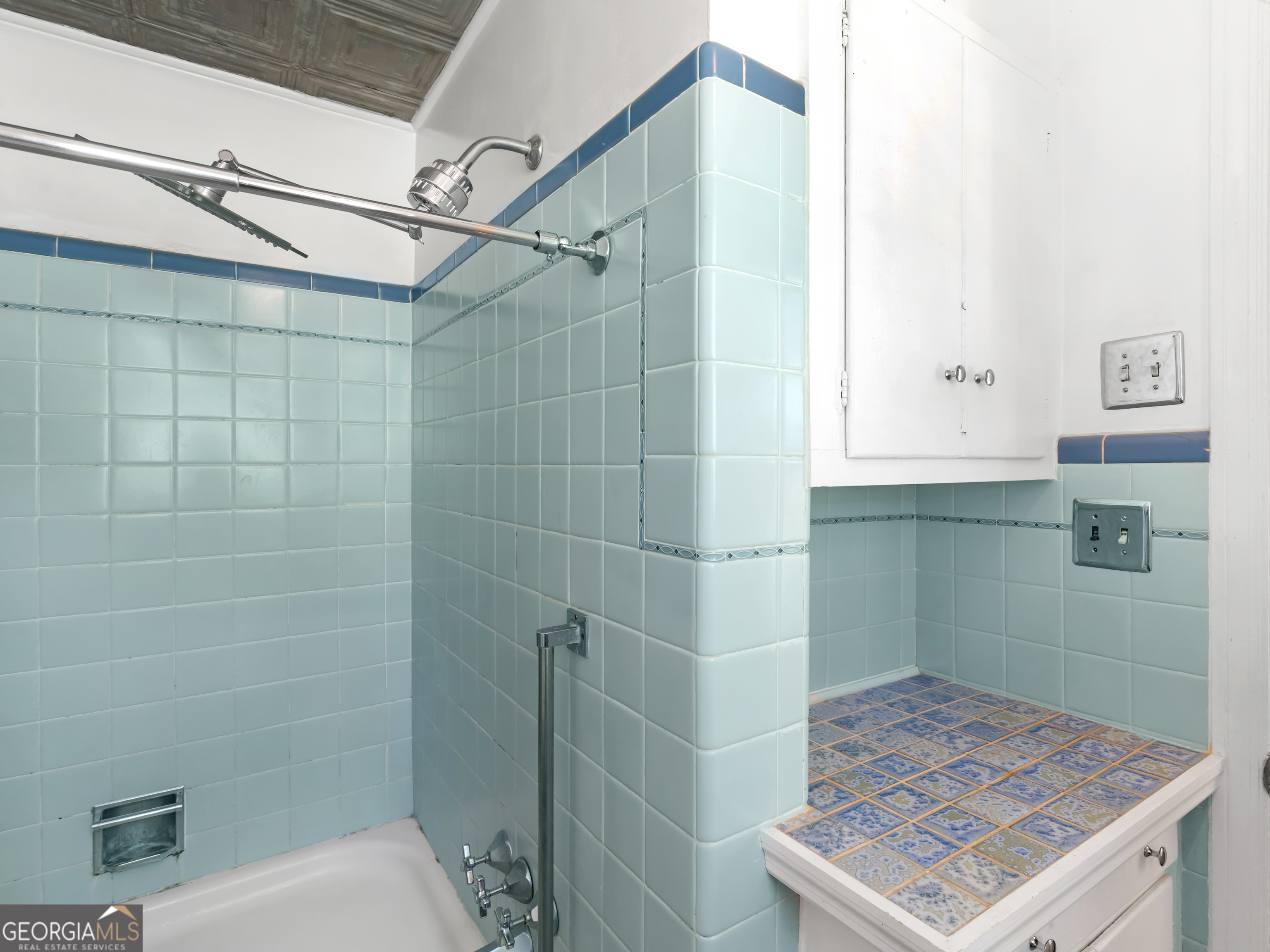 192 Corbin Avenue Macon, GA 31204 - Photo 25 of 35 a bathroom with a shower and a sink