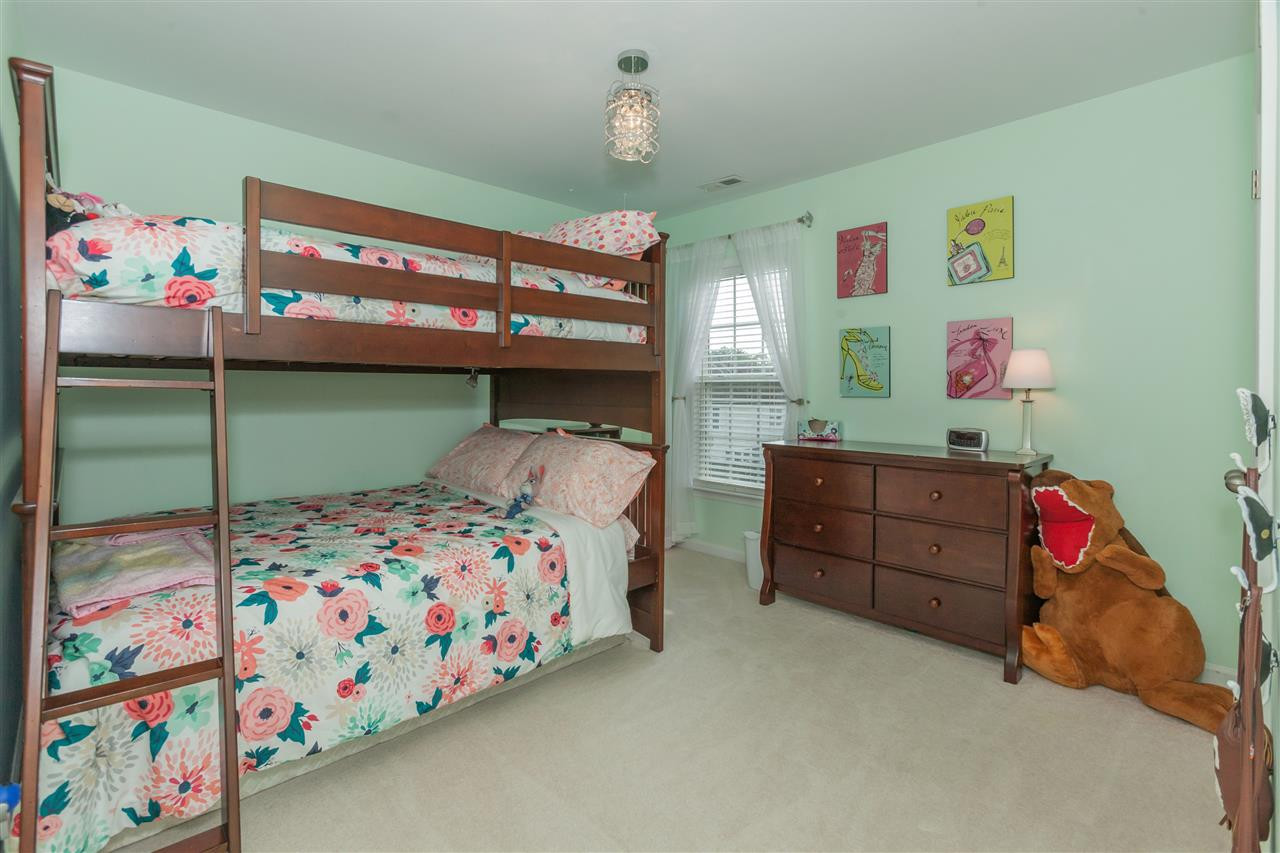 7613 Silver View Lane Raleigh, NC 27613 - Photo 18 of 25 One of three spacious secondary bedrooms. Bedroom