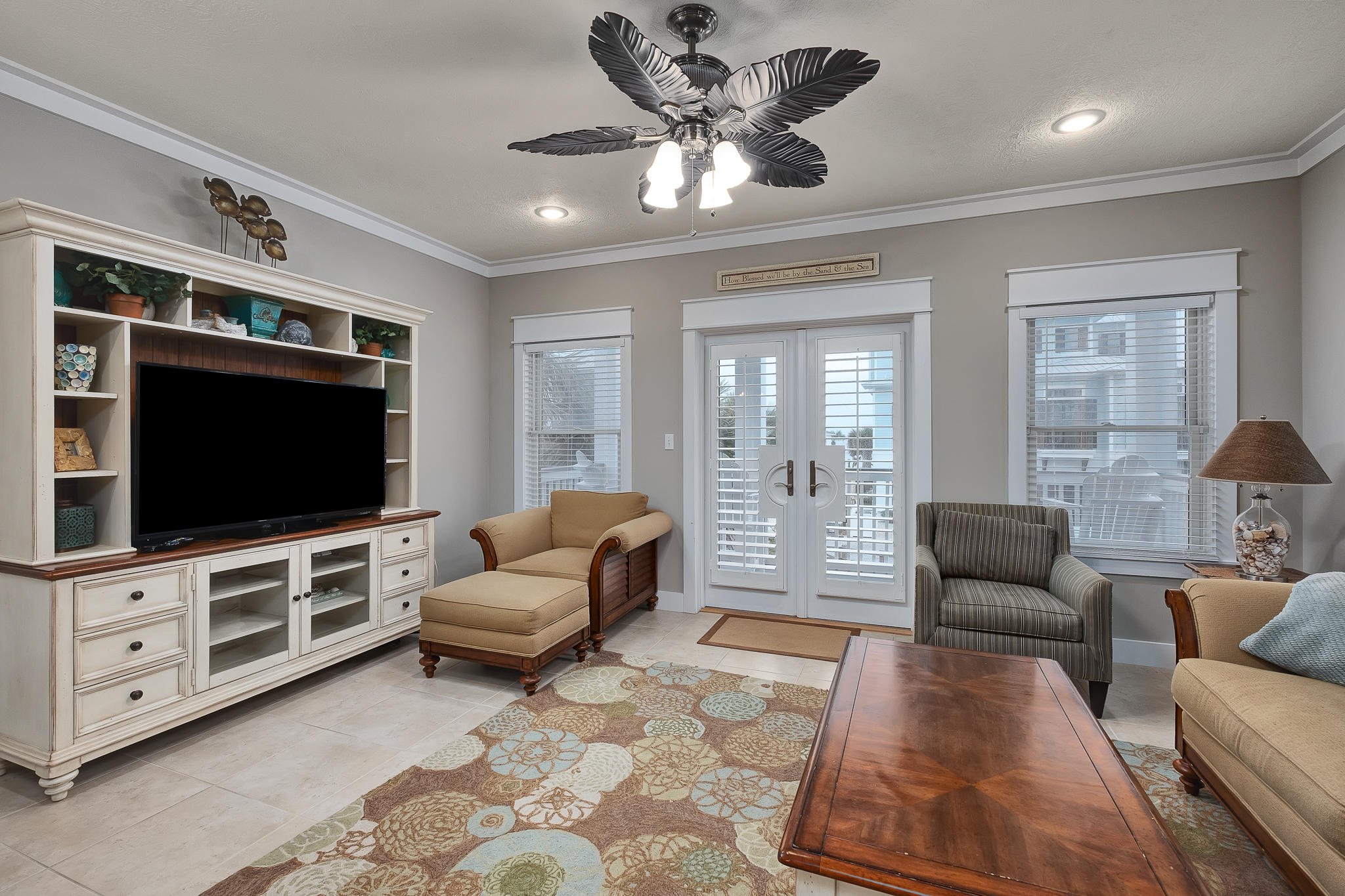 8968 East County Highway 30A Inlet Beach, FL 32461 - Photo 11 of 46 a living room with furniture and a flat screen tv