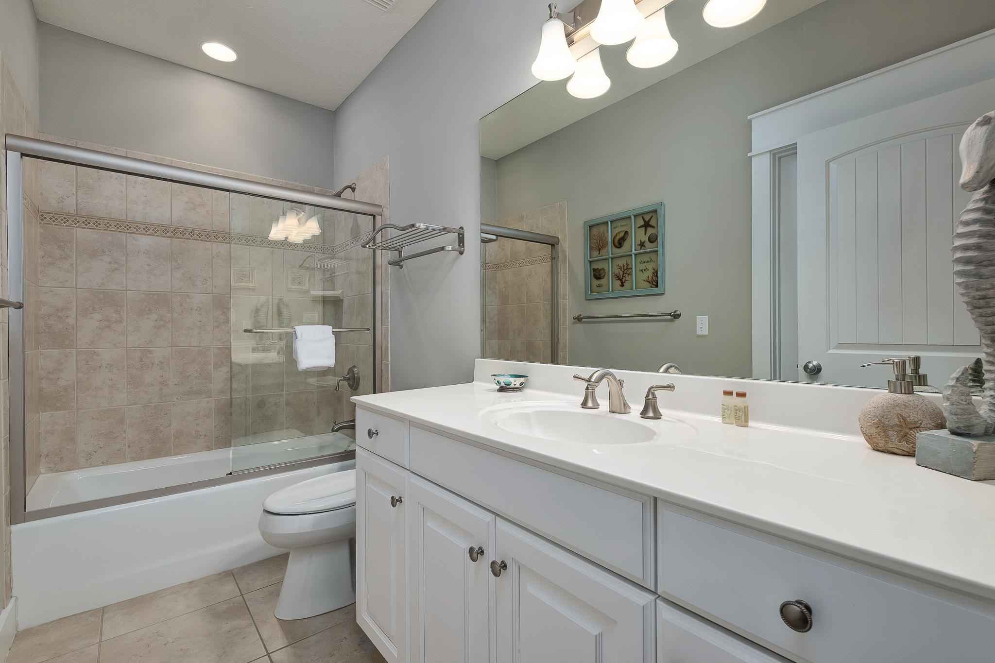 8968 East County Highway 30A Inlet Beach, FL 32461 - Photo 17 of 46 a bathroom with a double vanity sink mirror double and shower