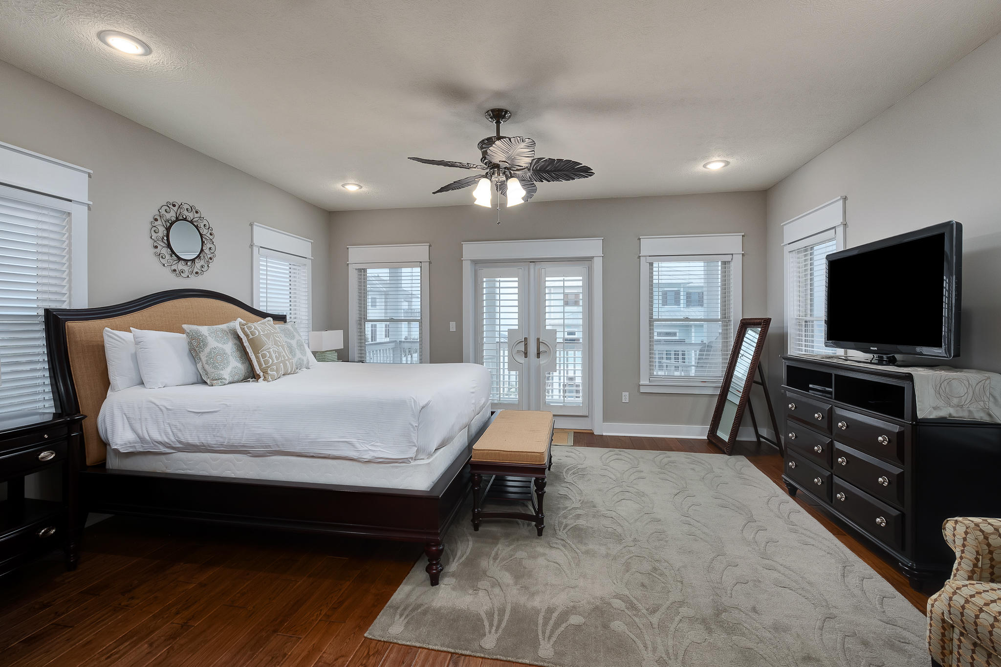 8968 East County Highway 30A Inlet Beach, FL 32461 - Photo 20 of 46 a bedroom with a bed and a flat screen tv