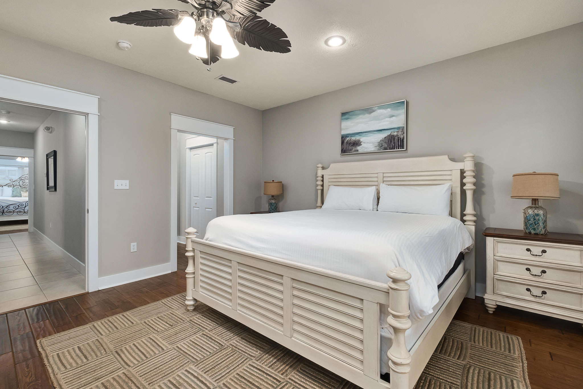 8968 East County Highway 30A Inlet Beach, FL 32461 - Photo 2 of 46 a bedroom with a bed and wooden floor