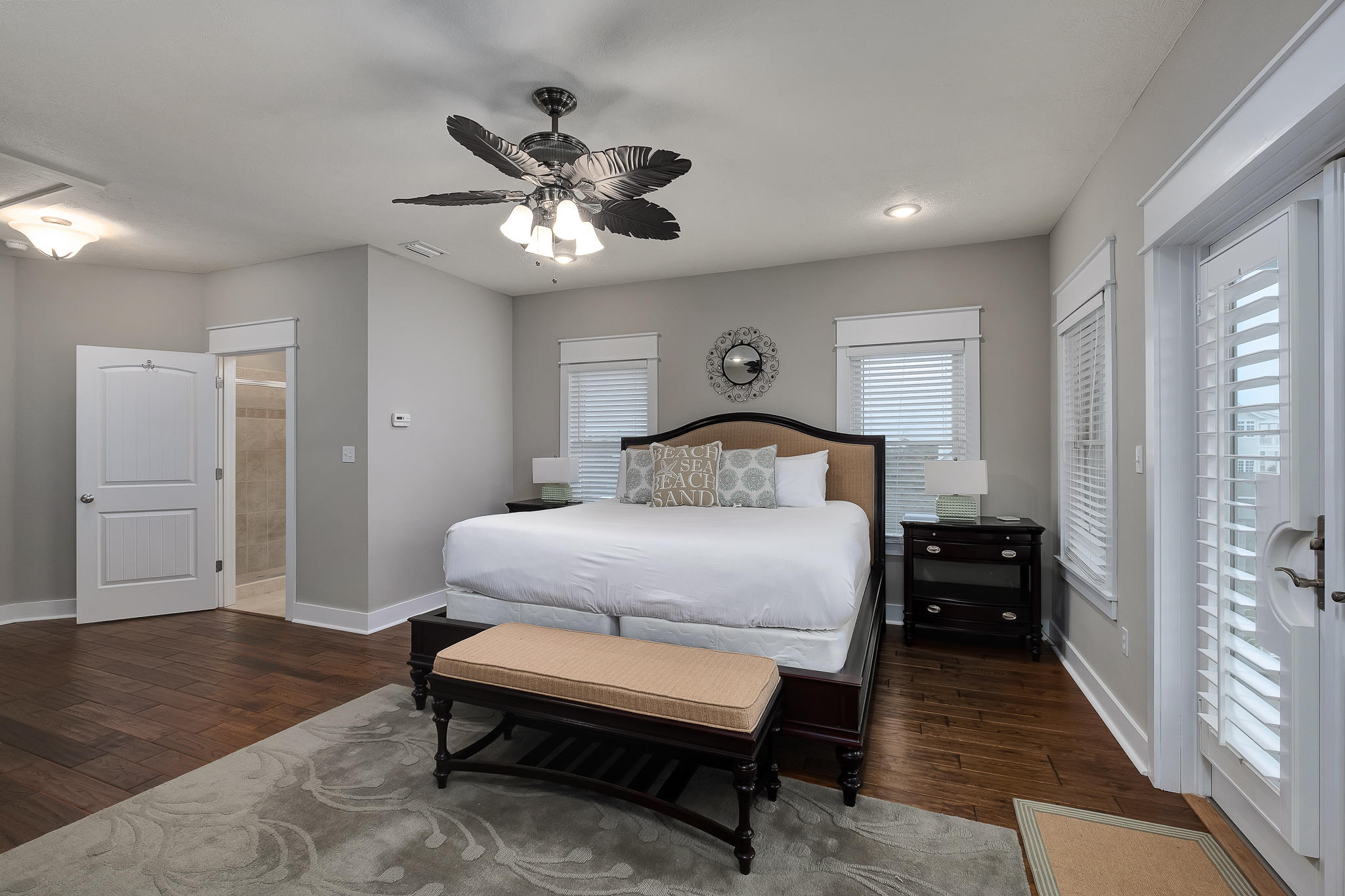 8968 East County Highway 30A Inlet Beach, FL 32461 - Photo 21 of 46 a bedroom with a bed and a chandelier
