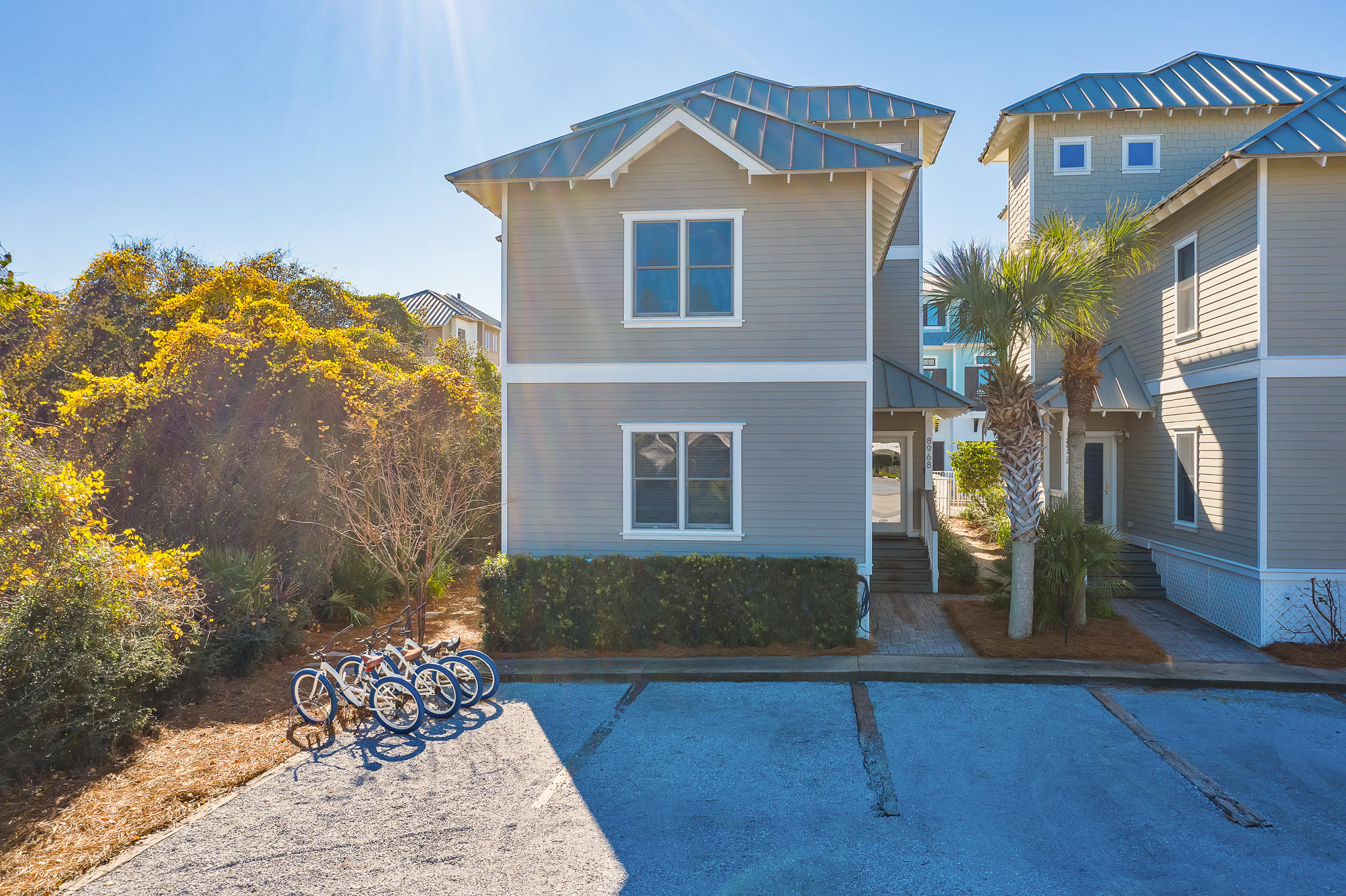 8968 East County Highway 30A Inlet Beach, FL 32461 - Photo 25 of 46 a front view of a house with garden