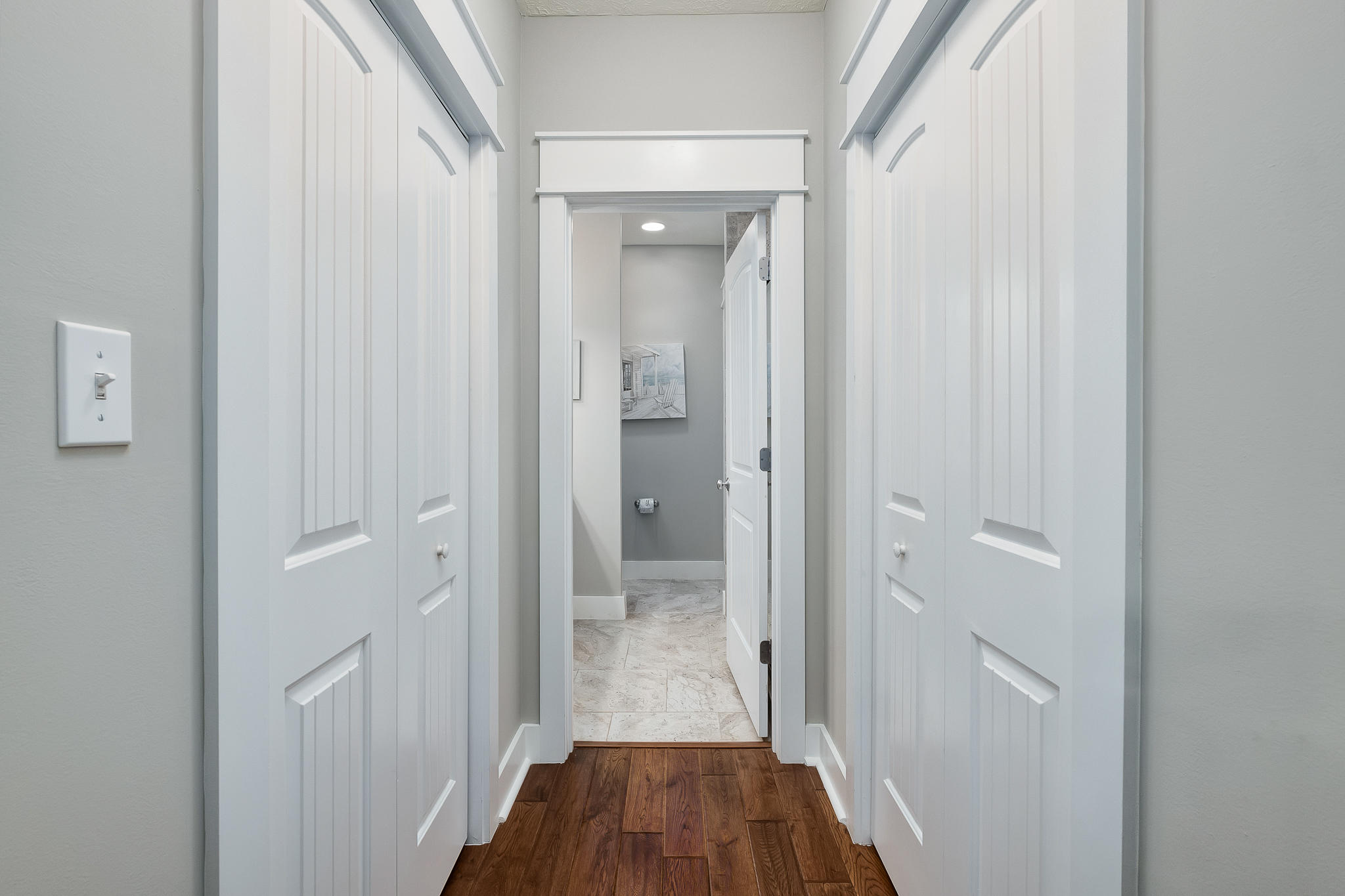 8968 East County Highway 30A Inlet Beach, FL 32461 - Photo 3 of 46 a view of a hallway with wooden floor