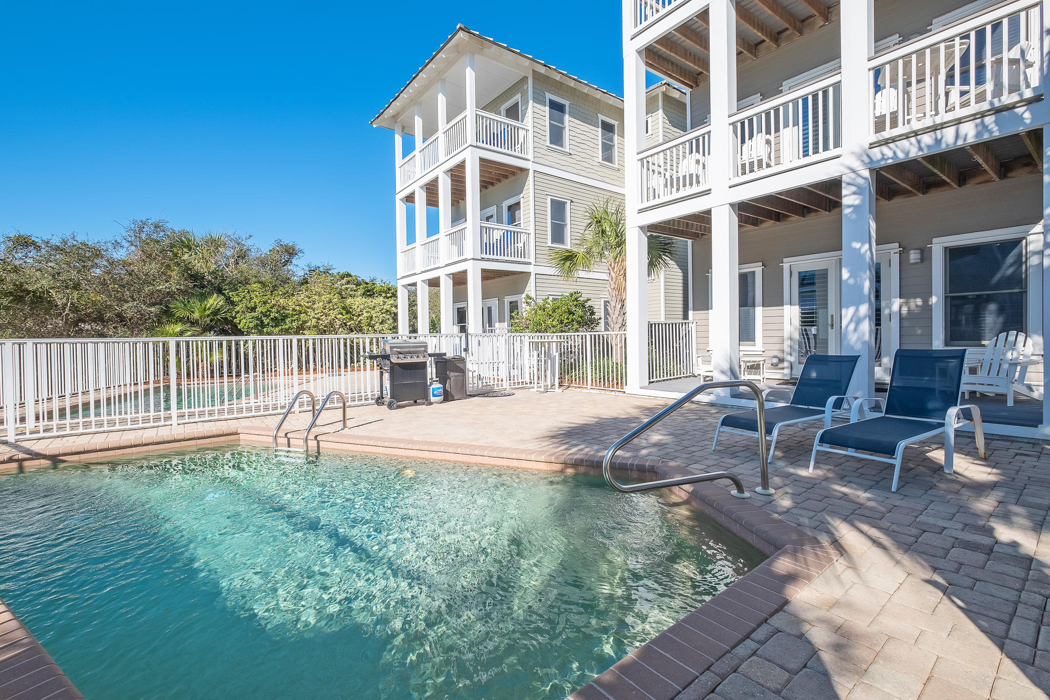 8968 East County Highway 30A Inlet Beach, FL 32461 - Photo 37 of 46 a view of a building with backyard and sitting area